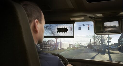 Sun visor with controllable transparency prevents glare