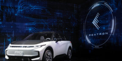 Foxconn debuts e-cars, plans vehicle software