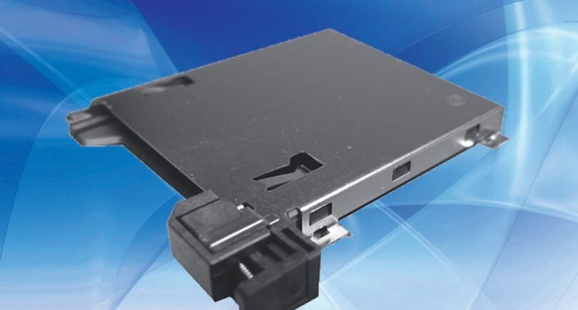 Vibration-resistant automotive SD card reader features push-lock system