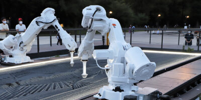 UK artist takes industrial robots to Tokyo – video